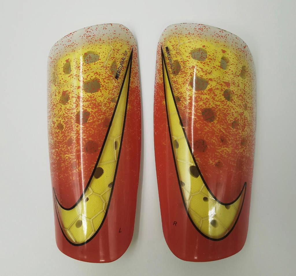 N14 generation Nike Mercurial Venomous Honeycomb shin guards orange