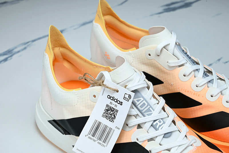 KI4780 ADIZERO ADIOS 4 M LOW-CUT RUNNING SHOES WHITE/ORANGE/BLACK
