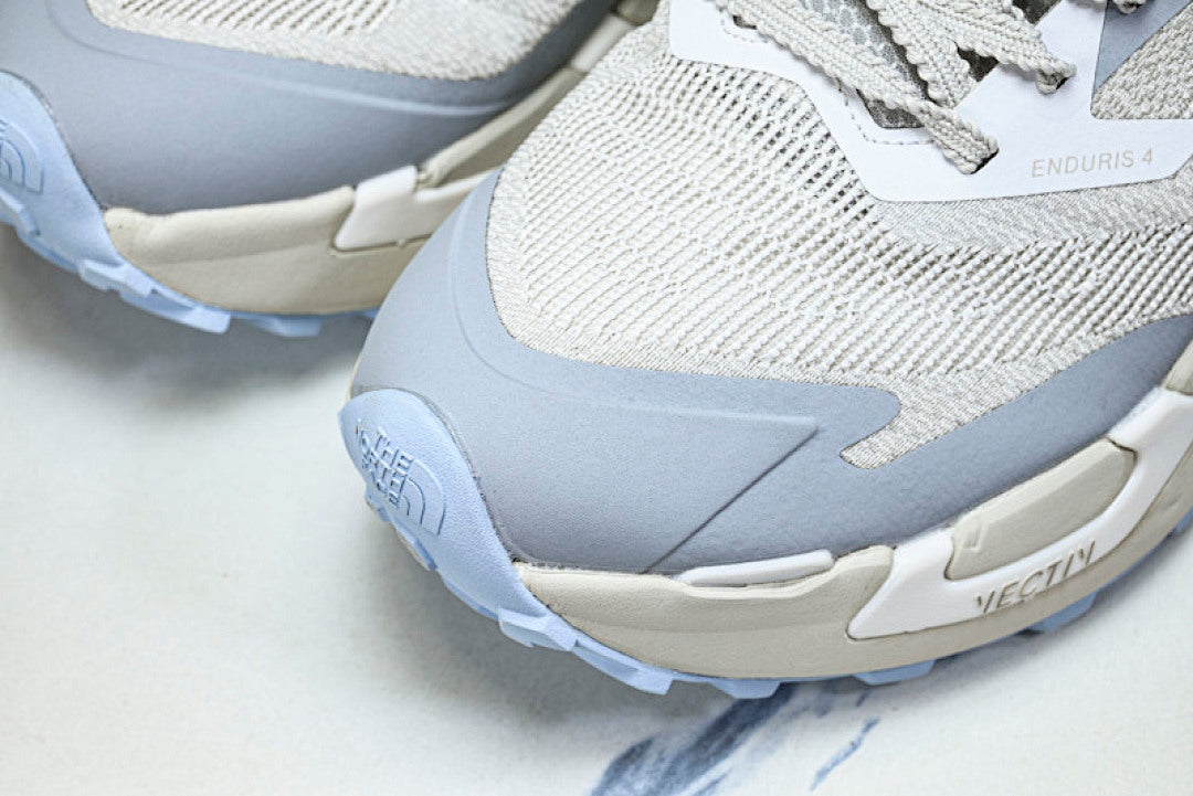 NS97R04A THE NORTH FACE ENDURIS 4 BLUE/GREY