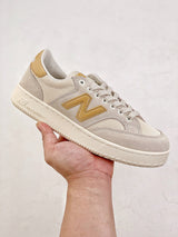 New Balance Pro Court
Beige Yellow