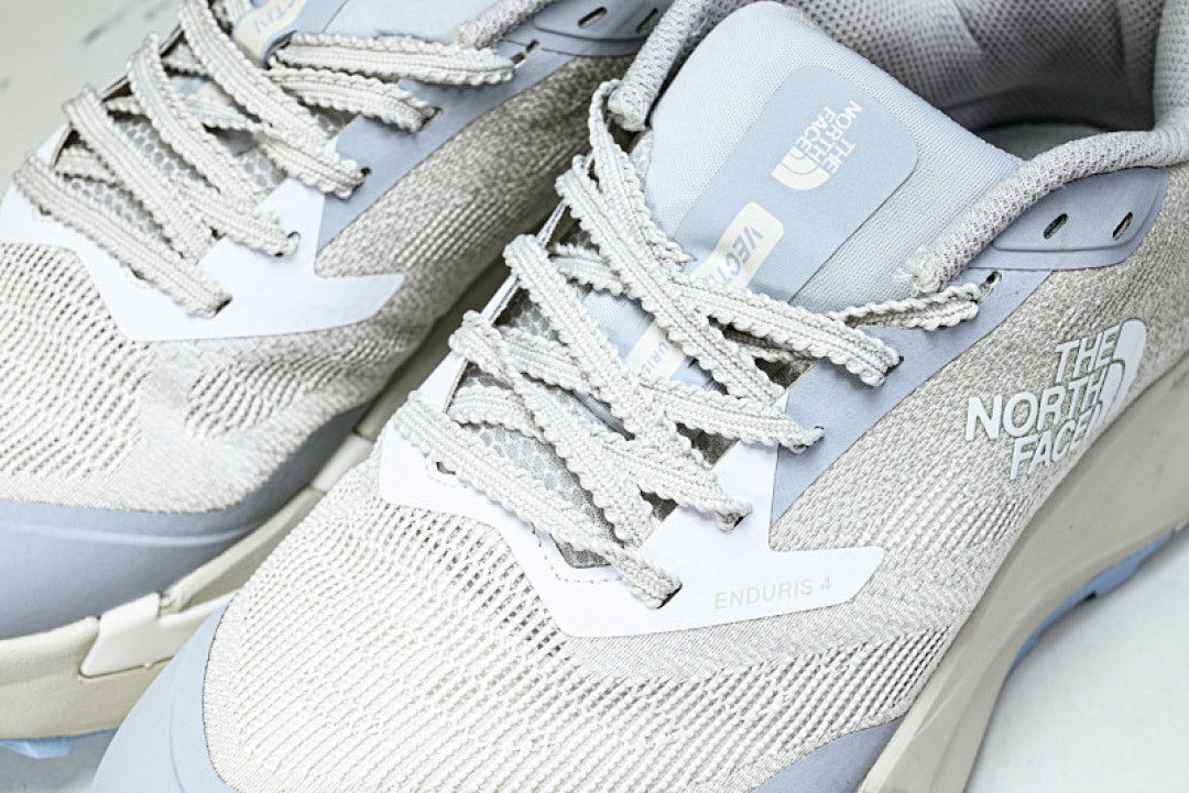 NS97R04A THE NORTH FACE ENDURIS 4 BLUE/GREY