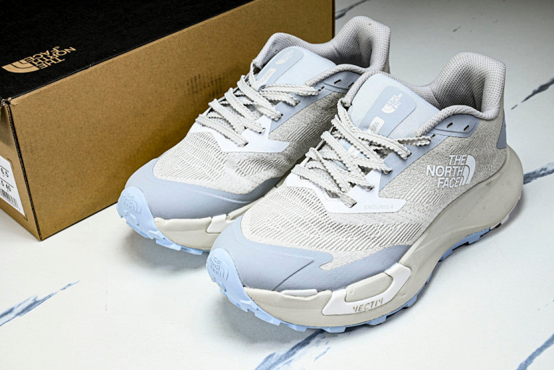 NS97R04A THE NORTH FACE ENDURIS 4 BLUE/GREY