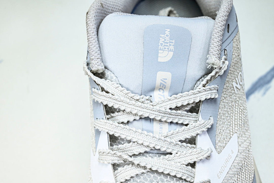 NS97R04A THE NORTH FACE ENDURIS 4 BLUE/GREY