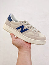 New Balance Pro Court
Beige blue