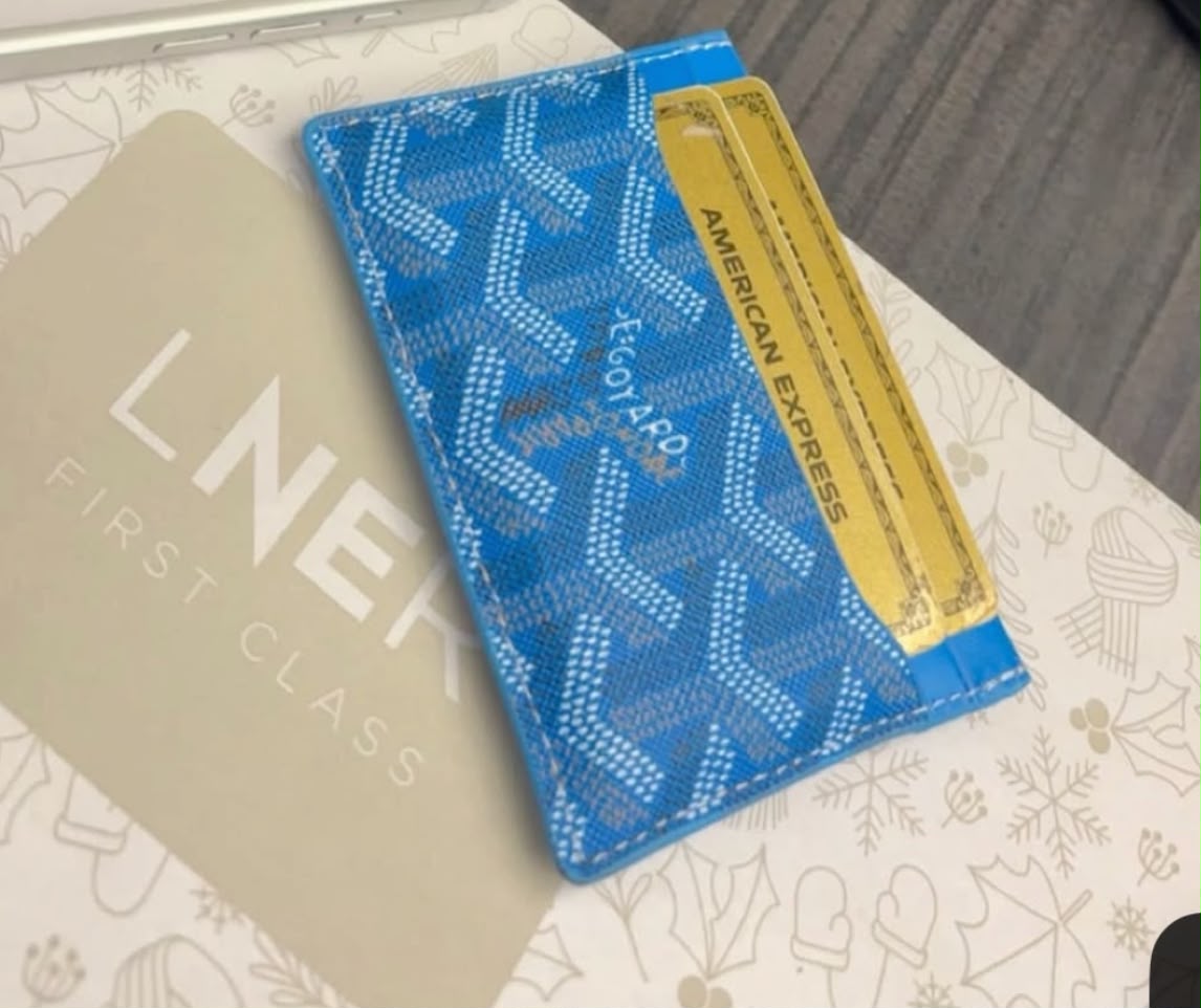 blue Goyard Saint-Sulpice card holder features the iconic chevron coated canvas pattern.