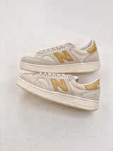 New Balance Pro Court
Beige Yellow
